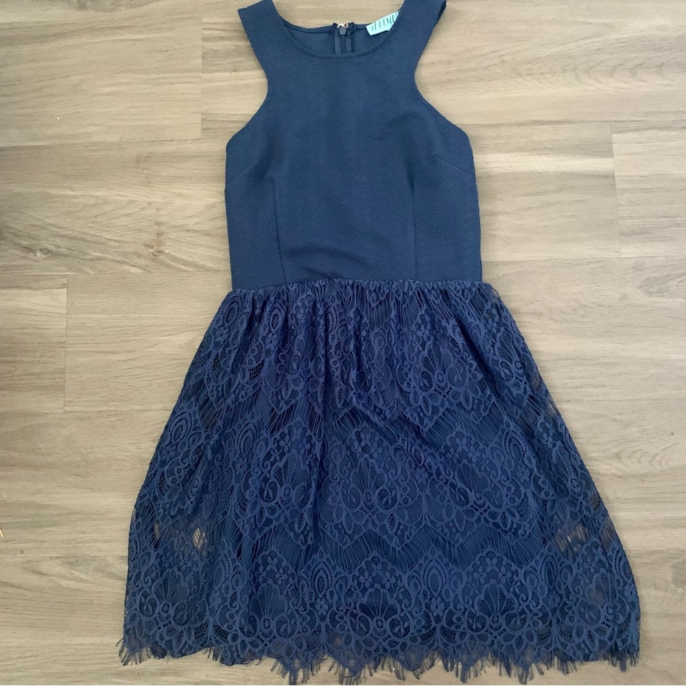 Francesca’s boutique dress, navy blue, racer back, slim bodice, lace bottom.